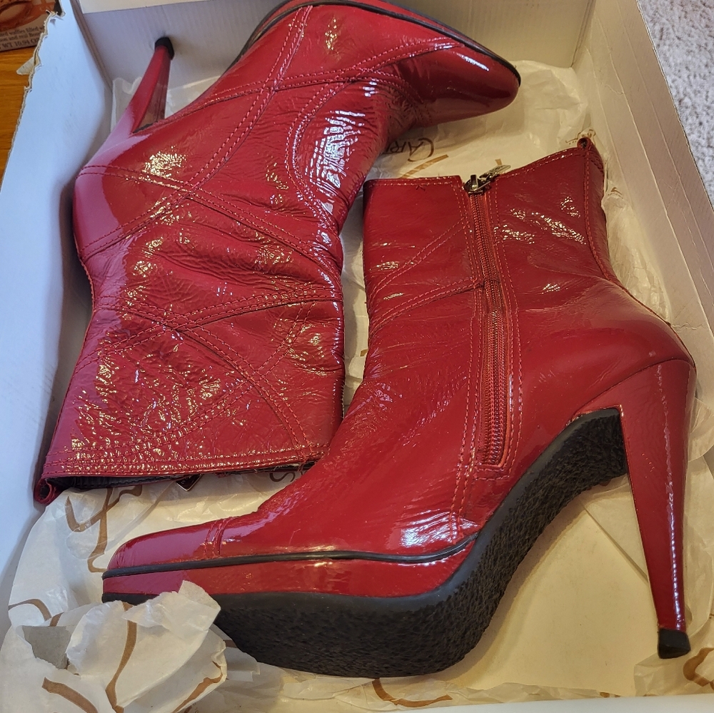 Red leather boots by Carlos